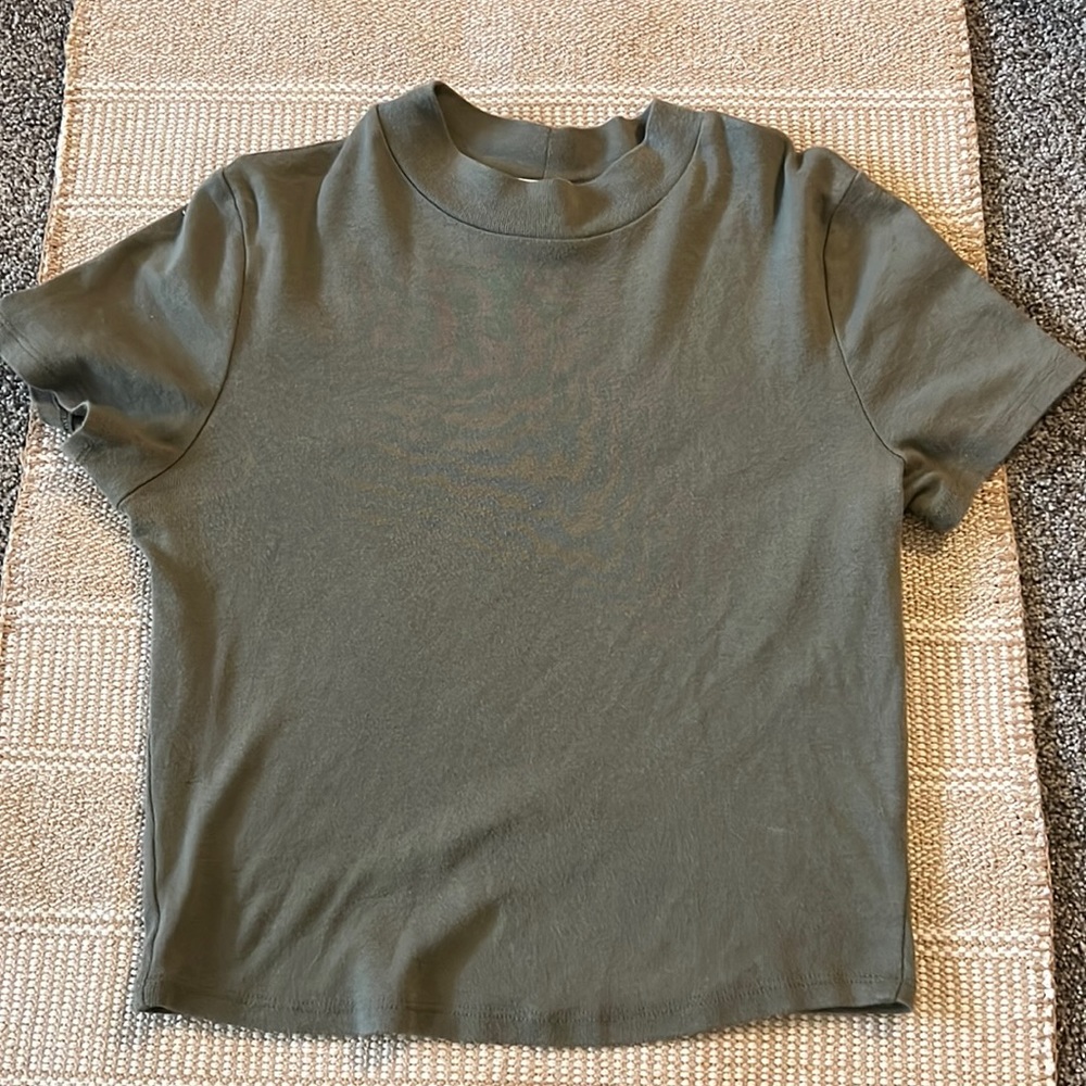 green mockneck tee